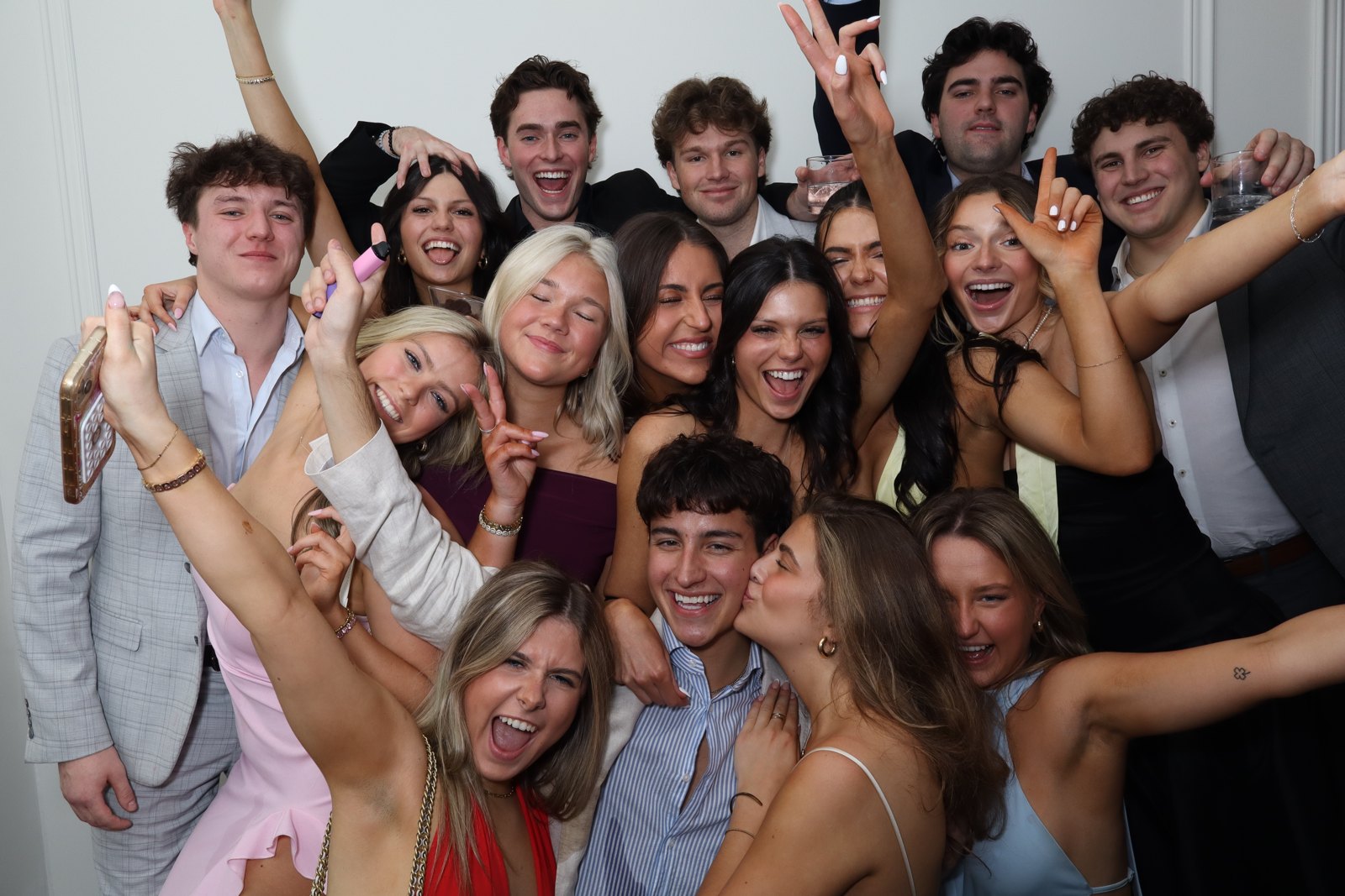 Large group of guests celebrating together at the booth