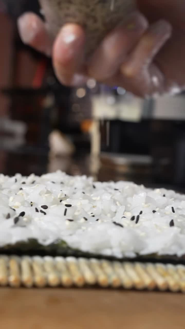 Chef preparing a detailed food shot for restaurant content